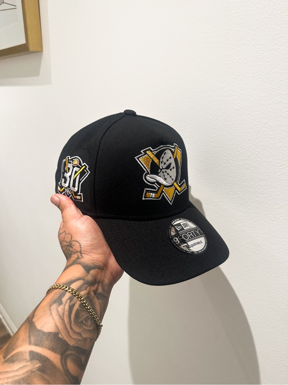 New Era Black Anaheim Ducks 9FORTY Cap with Yellow Accents